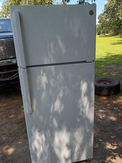 Beer fridge..used with some dents but good for mancave/garage/shed