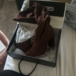 knee high length heeled boots