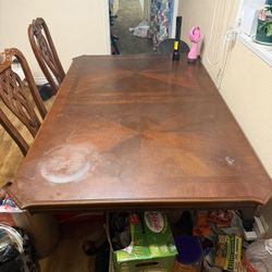 Dinner table set for 6  92”x43”x30”(with Leafs)