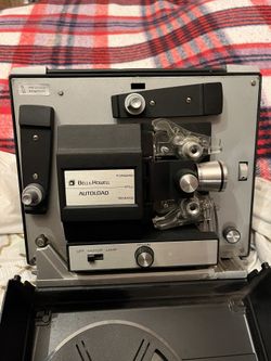 Bell & Howell -projector, screen, reel & Keystone Kops movie