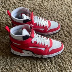 Red And white Puma High tops 