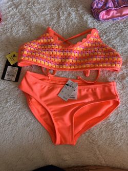 2 brand new little girls swimsuits