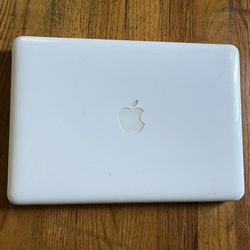 Laptops Older Model ( Non-working 4 Laptops, 1 MacBook)