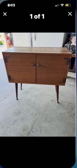 Vintage Wooden Cabinet With Distinctive Exposed Metal Straps And 2 Cabinet Doors 33” Hx42” Lx16”W