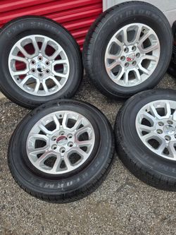 Chevy silverado or gmc rims tires 80%