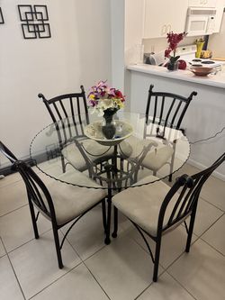 Round Glass Top Dining Table with 4 Wrought Iron Scroll Chairs