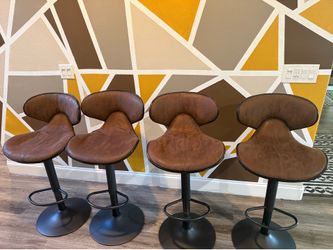 Adjustable bar/counter stools with foot rests