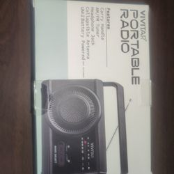 NEVER USED/SEALED.  Vivitar AM/FM Portable Weather Radio 