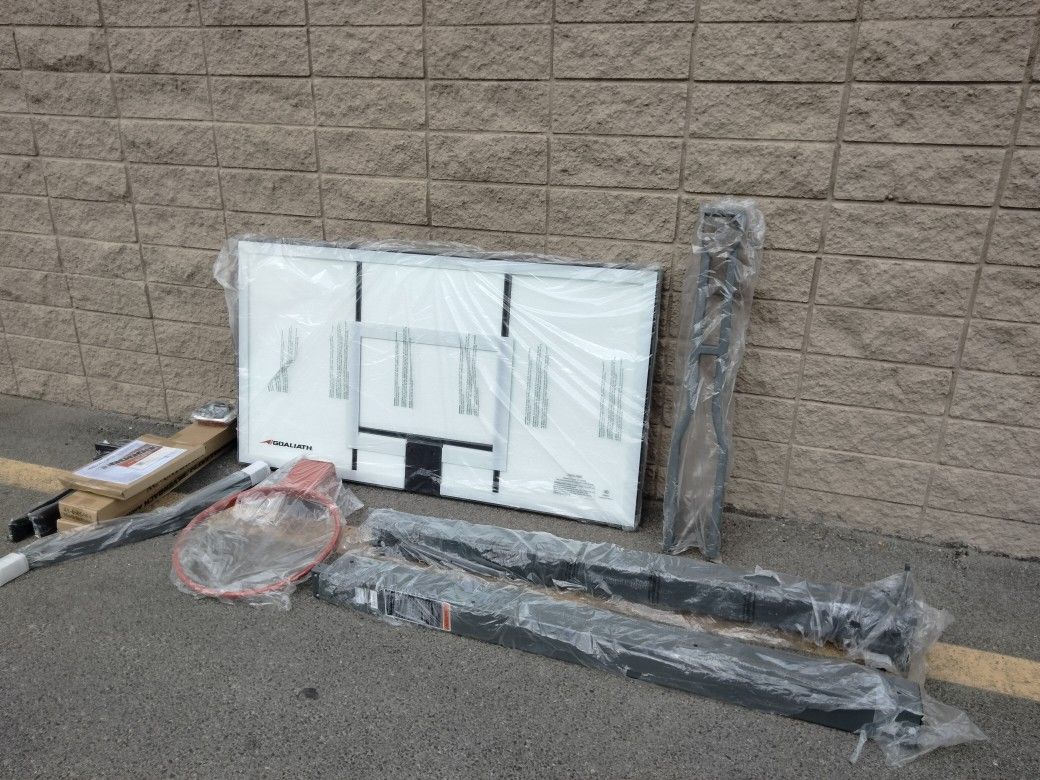 Goaliath 54 inch in ground basketball hoop, adjustable basketball court