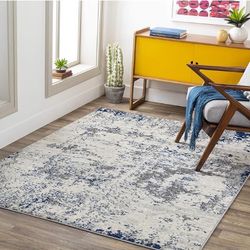 8 x 10 rug (navy and gray)