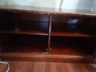 Small dresser 2 doors 2big shelves in each side deep 3foot x5foot long very heavy  couple of scratches asking $35,