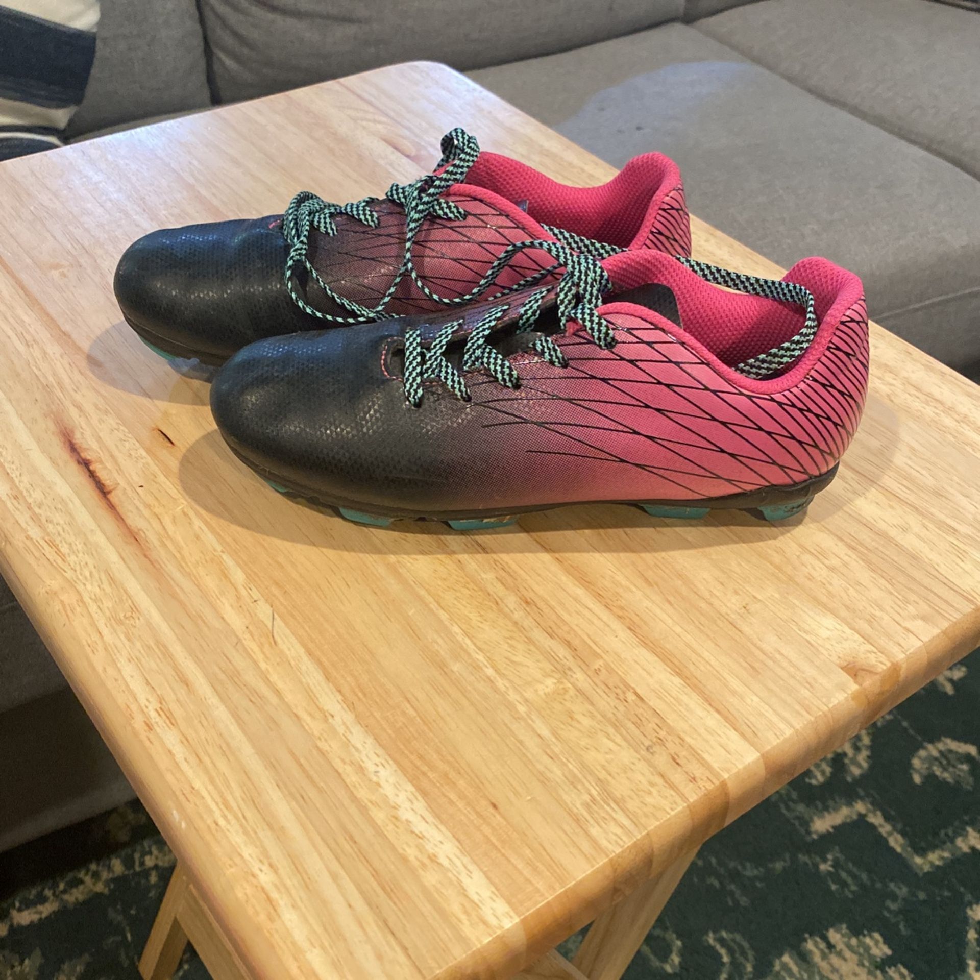 Pink And Black Cleats Size 2
