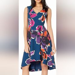 Trina turk dress designer high end luxury $200 Sexy floral blue used once size 2