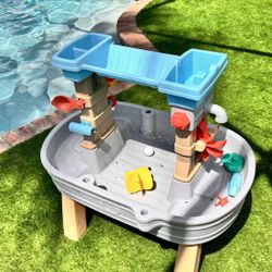 Water play table Kids waterfall with toys  (Used twice) 