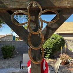 Rustic wall cross handcrafted from authentic metal horseshoes