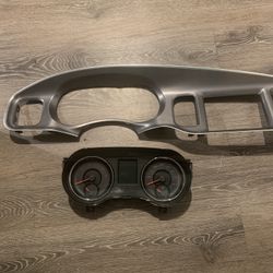 The 11-14 Dodge Charger Bezel And Speedometer 