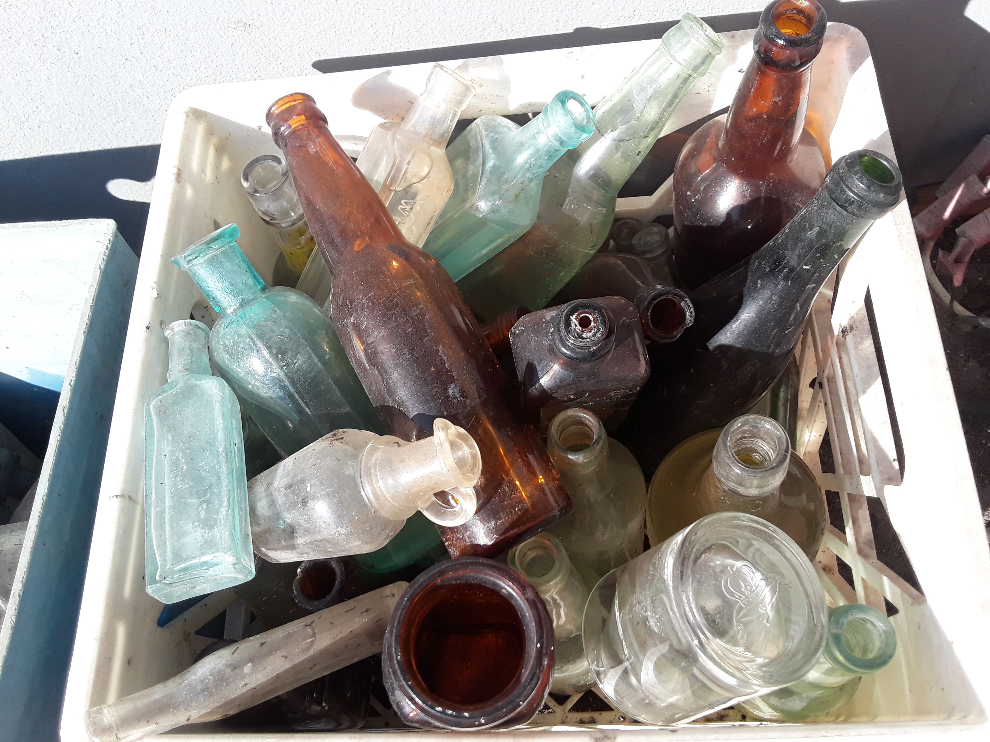 Pre-1900 glass antique bottles, mason jars, medicine bottles, etc.