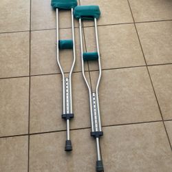 Crutches With Padded Arm And Hand Pieces 
