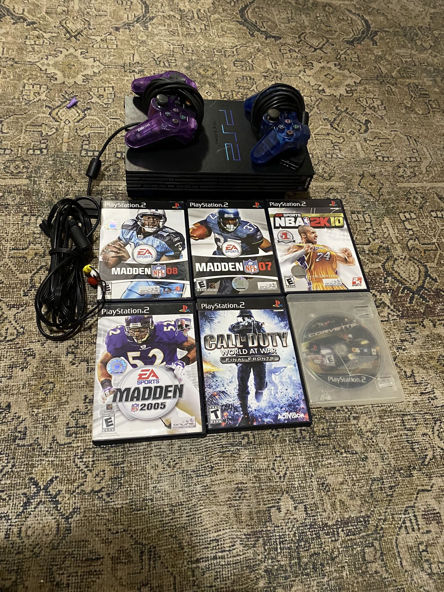 PS2 With 2 Controllers, It Comes With All The Wires For The PS2 And The Games.