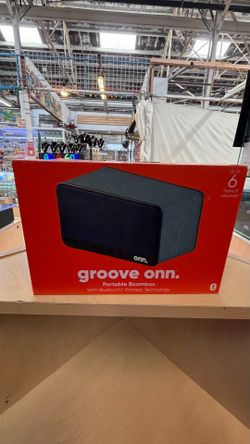 Portable onn. boombox has Bluetooth wireless technology and a digital FM radio. This blue and black speaker with fabric covering provides up to 6 hour