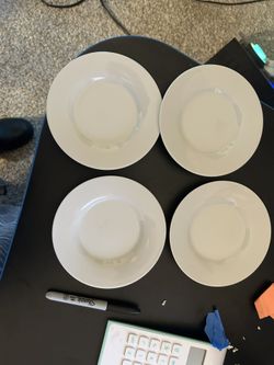 Set Of 4 White Plates.