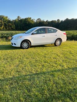 White Nissan Versa 2013