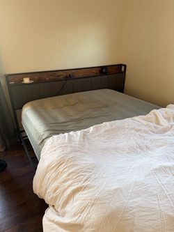 Bed frame with outlet