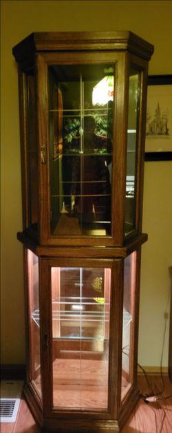 Lighted corner curio cabinet