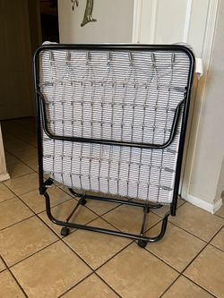 New folding bed with mattress