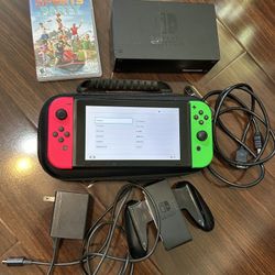 Nintendo Switch Console with Green Pink Joycons, cords, dock, case and sports party