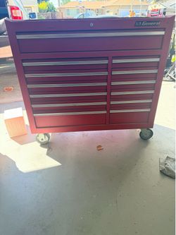 Roll away bottom tool box
