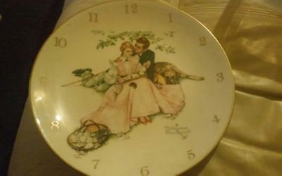 Norman rockwell china plate from 1955 that is ready to make a clock out of it.