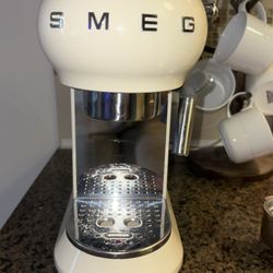 smeg espresso machine and stainless espresso cups 