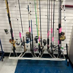 Assorted Fishing Rods With Reels