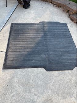 Truck bed mat