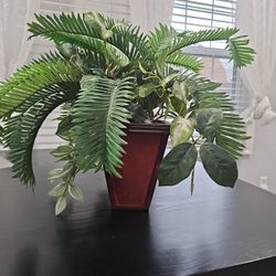 Jungle Themed Flower With A Wooden Vase