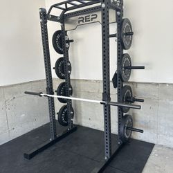 REP Fitness Squat Rack + Barbell + Weights