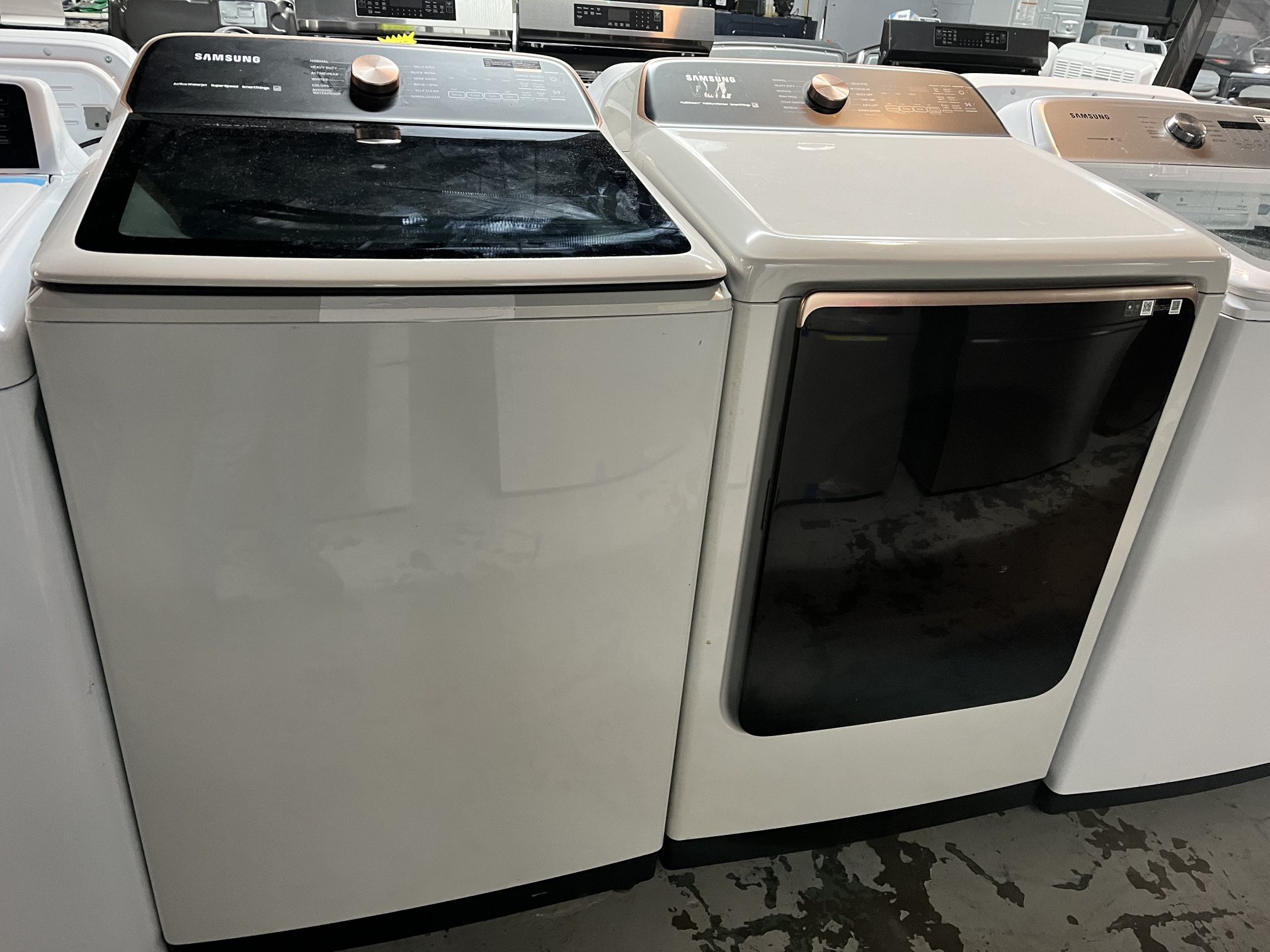 Samsung 5.5 Cu. ft. Smart Top Load Washer And Samsung - 7.4 Cu. Ft. Smart Electric Dryer with Steam