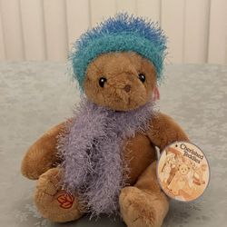 Cherished Teddy with fuzzy hat and scarf, heart on chest and leaf stitched on foot  