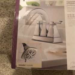 Brand new chrome bathroom faucet. Center set