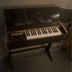 an Electric chord organ 