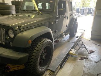 Alignment suspension brakes lift kits mechanic