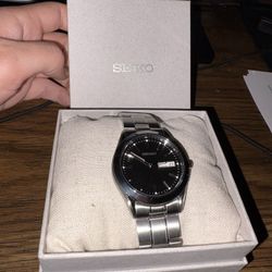 Seiko Men’s Essentials Black Face Stainless Steel 