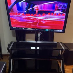 Entertainment System (55” LG TV, 2.1 Channel Soundbar, Swivel Glass TV Stand)