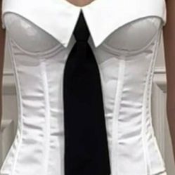 WHITE SMALL NEW CORSET W/ATTACHED BLK TIE  $11. Cash & Pu only
