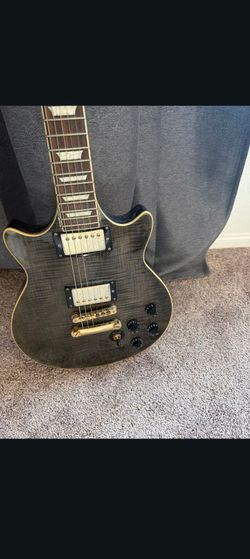 Epiphone electric new string guitar