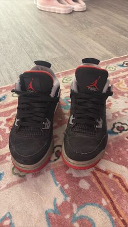Varsity Red Jordan 4  Retro Bred