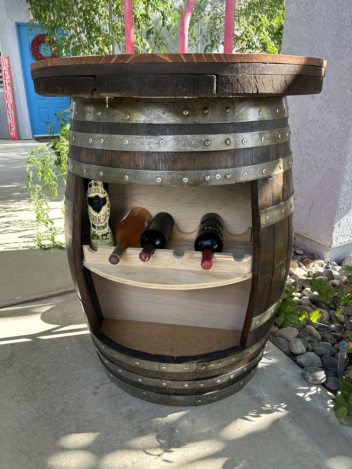 Rustic Indoor/outdoor barrel bar. 