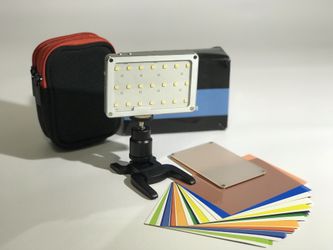 Little video camera with rechargeable battery and filter kit