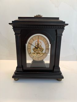 $100 Black Wood / Gold Mantel Clock excellent condition